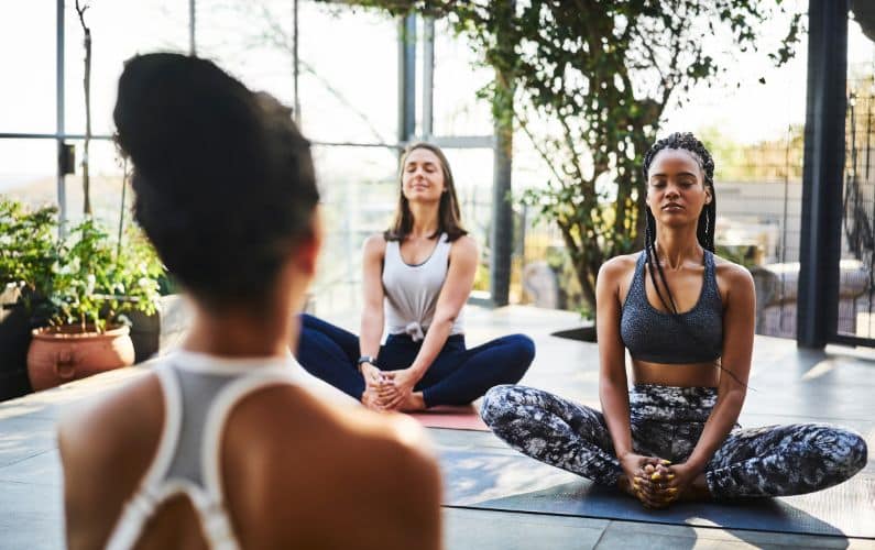 5 Ways Energy Healing Can Transform Your Yoga Business